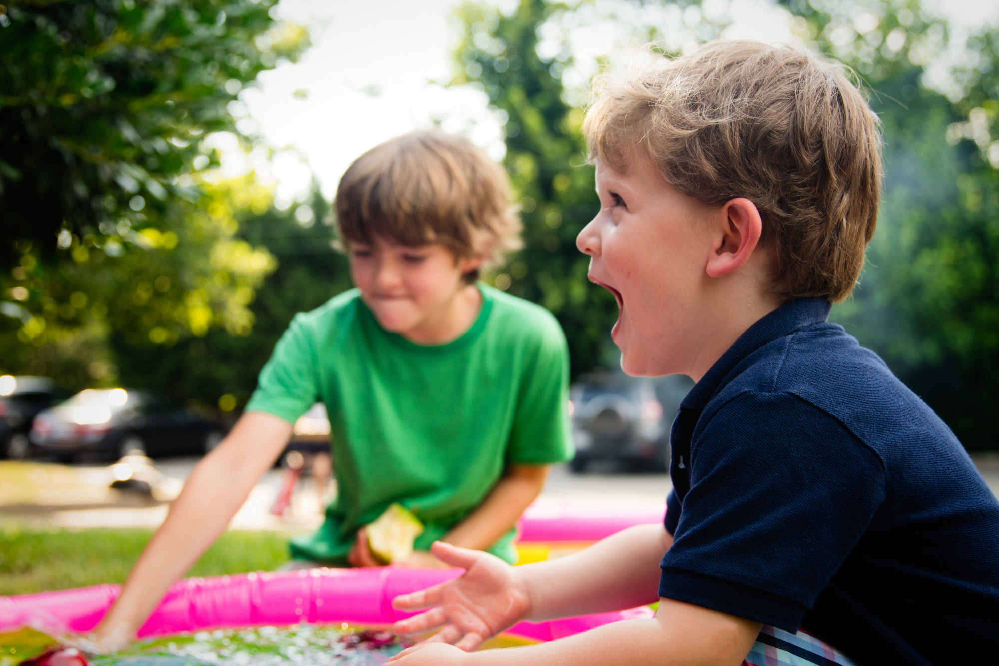 Two boys playing outside
